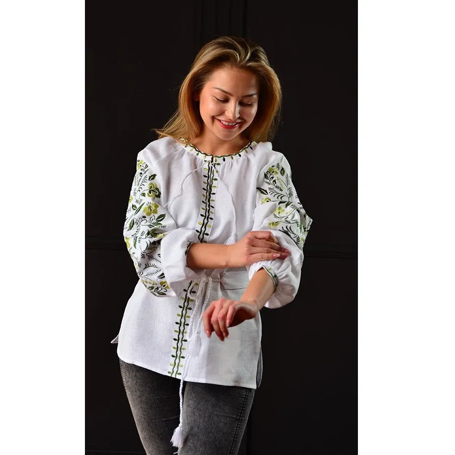 Women's blouse with floral embroidery pattern